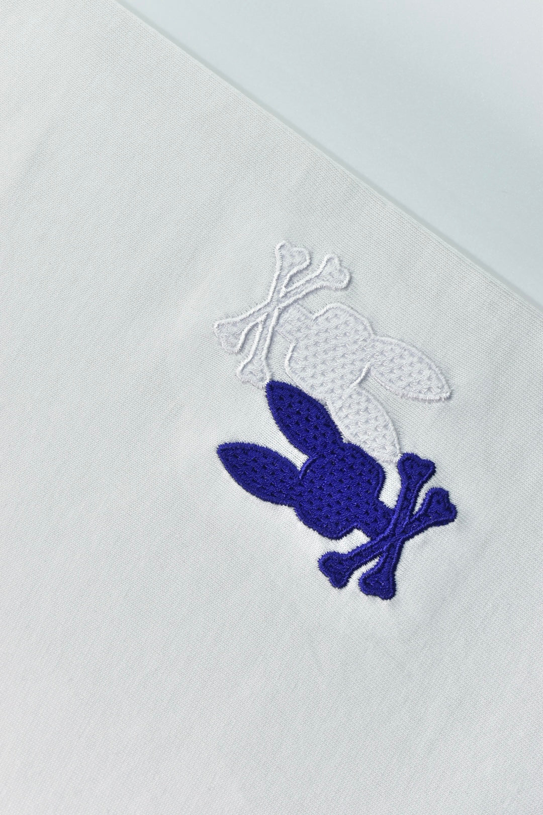 CAMISETA PSYCHO BUNNY COLECCION ORIGINAL BLANCO ESTAMPADO MORADO CONEJO