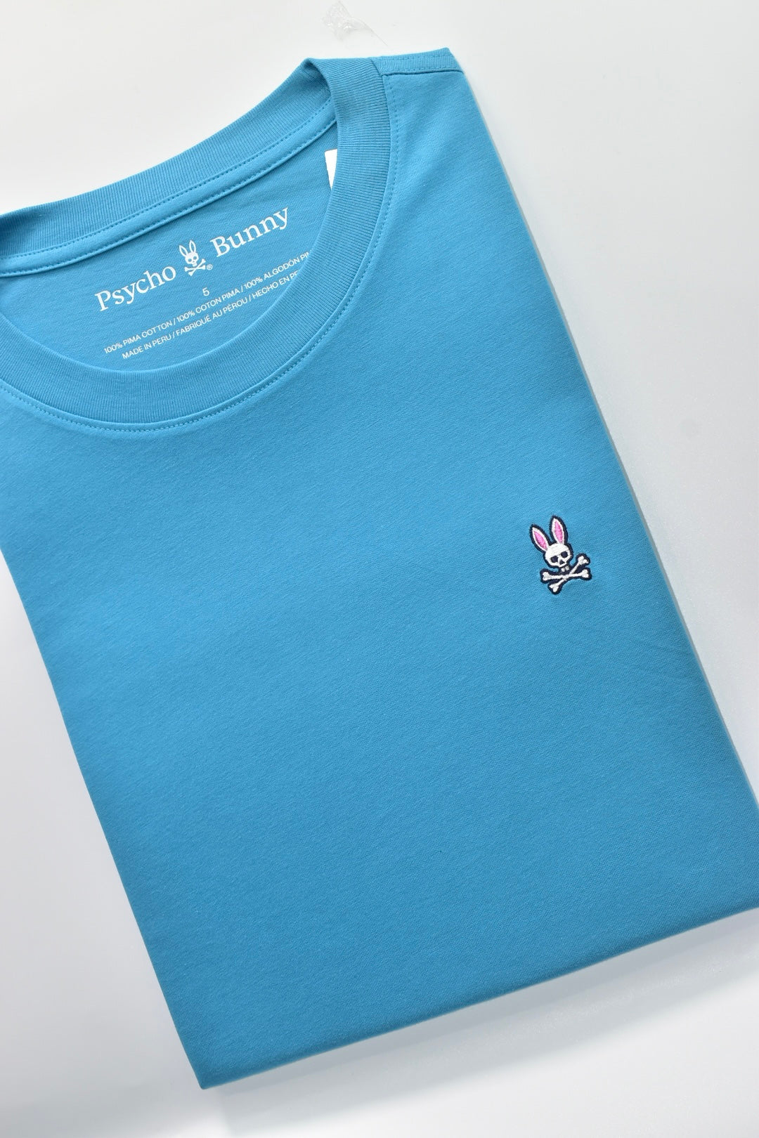 CAMISETA BASICA PSYCHO BUNNY ORIGINAL AZUL CAPRI