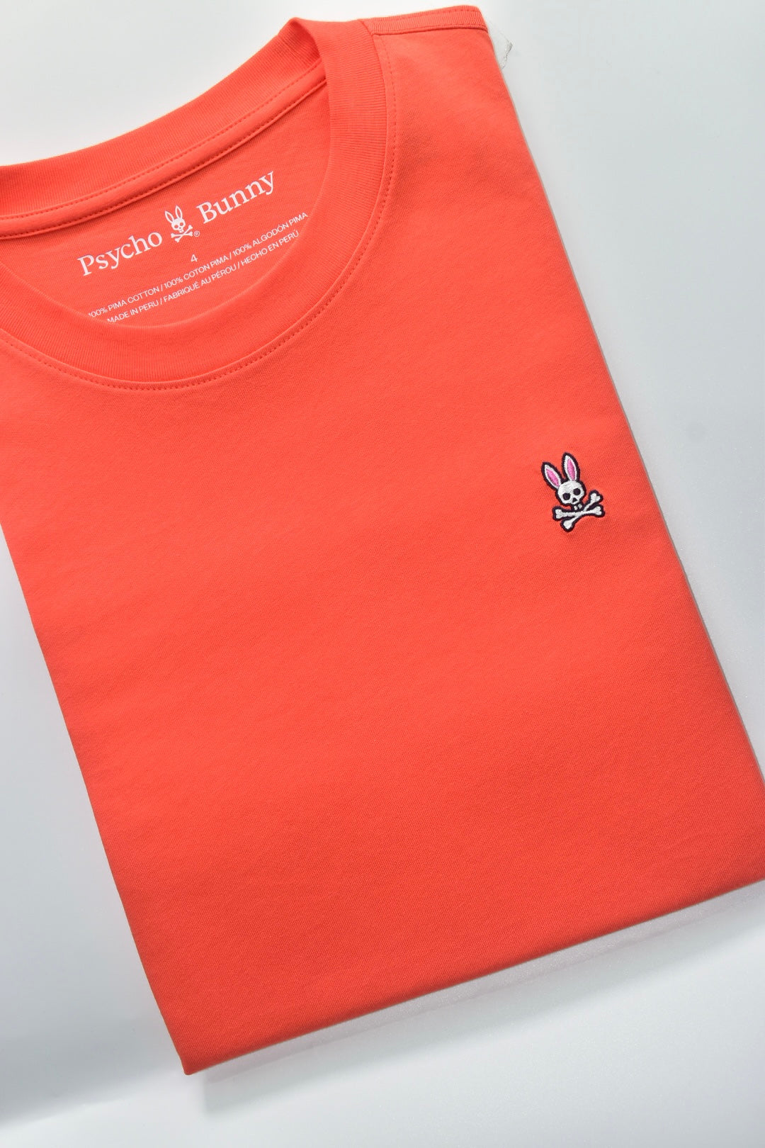 CAMISETA BASICA PSYCHO BUNNY ORIGINAL NARANJA CLARO