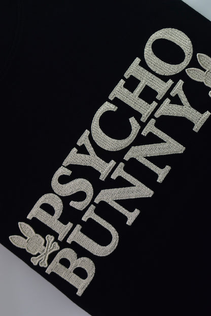 CAMISETA PSYCHO BUNNY COLECCION ORIGINAL NEGRO ESTAMPADO BEIGE TEJIDO