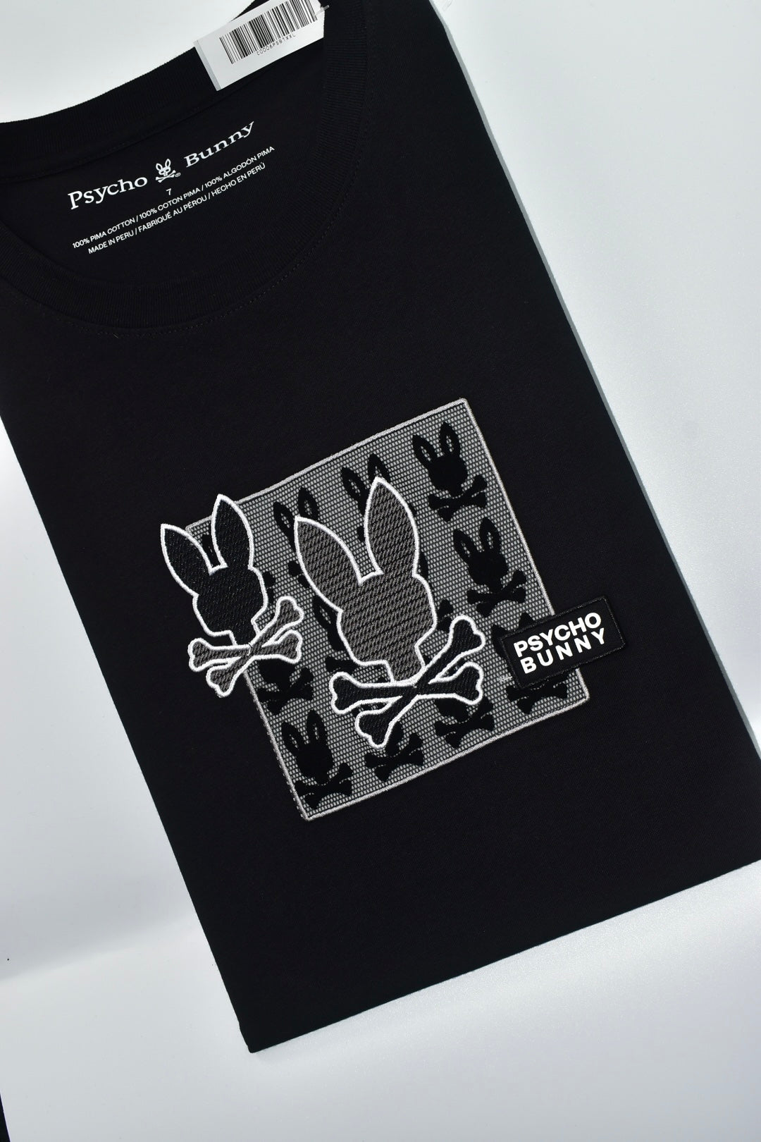 CAMISETA PSYCHO BUNNY COLECCION ORIGINAL NEGRO ESTAMPADO CUADRO GAMUSA