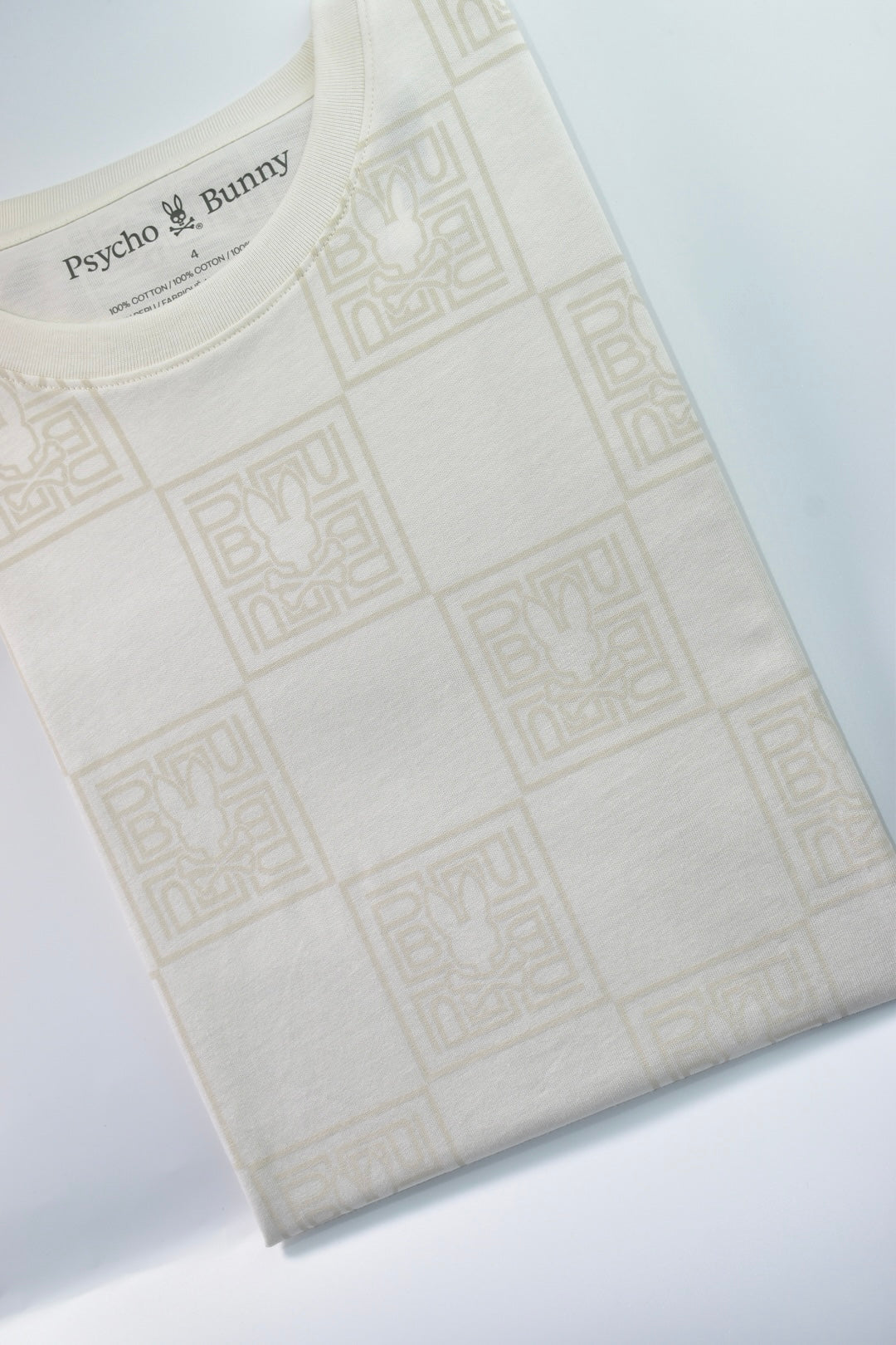 CAMISETA PSYCHO BUNNY COLECCION ORIGINAL BEIGE ESTAMPADO CAQUI TRIBAL