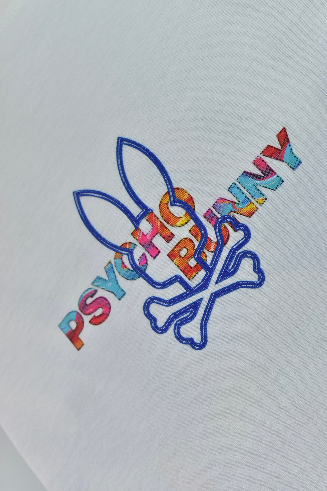 CAMISETA PSYCHO BUNNY COLECCION ORIGINAL BLANCO ESTAMPADO AZUL PB COLORES
