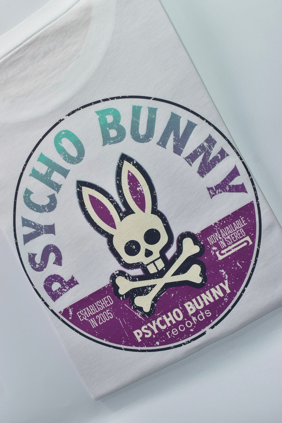 CAMISETA PSYCHO BUNNY COLECCION ORIGINAL BLANCO ESTAMPADO PB RECORDS