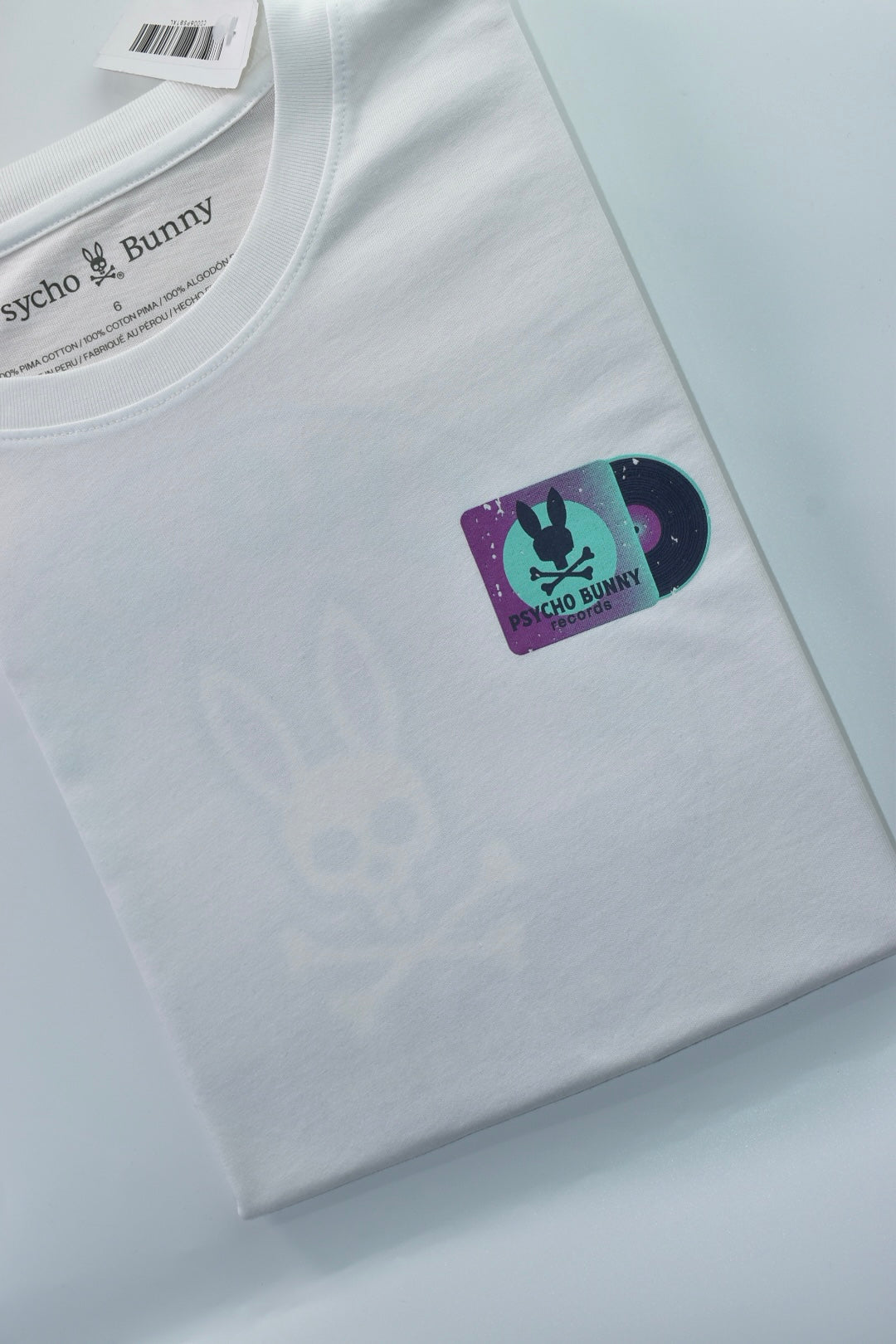 CAMISETA PSYCHO BUNNY COLECCION ORIGINAL BLANCO ESTAMPADO PB RECORDS