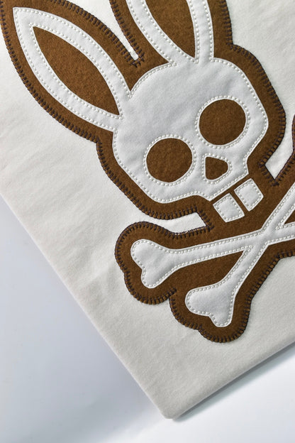 CAMISETA PSYCHO BUNNY COLECCION ORIGINAL BLANCO GRABADO CAFE Y BLANCO