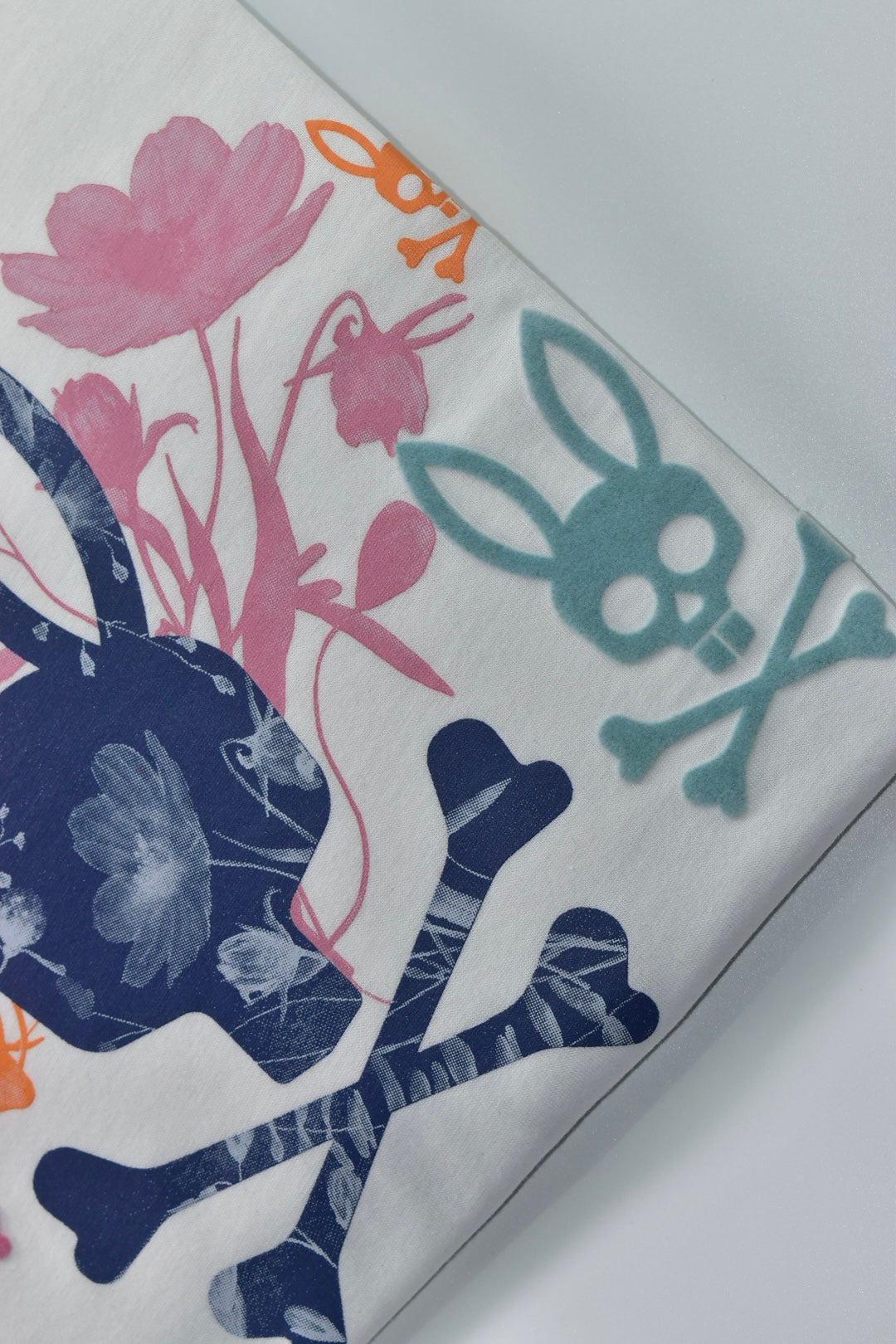 CAMISETA PSYCHO BUNNY COLECCION ORIGINAL BLANCO ESTAMPADO FLORIADO NARANJA