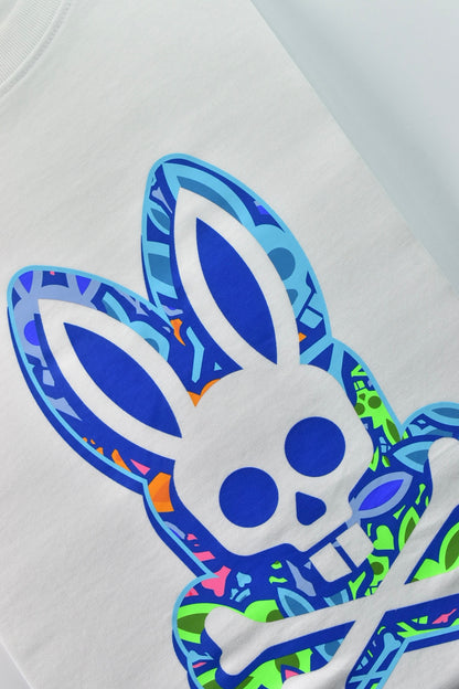 CAMISETA PSYCHO BUNNY COLECCION ORIGINAL BLANCO ESTAMPADO CALABERA FLUORESENTE