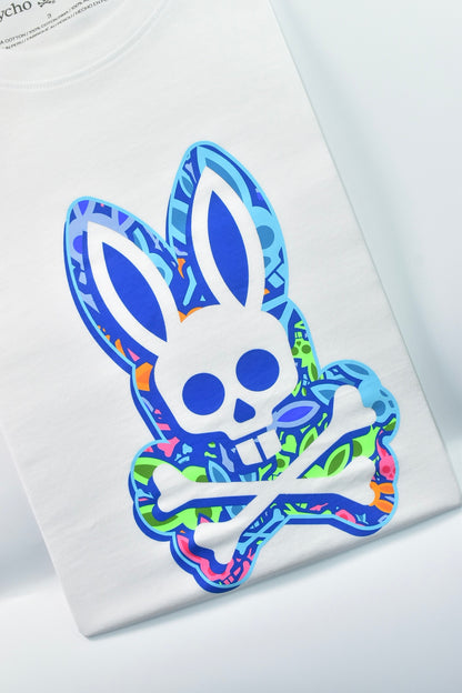 CAMISETA PSYCHO BUNNY COLECCION ORIGINAL BLANCO ESTAMPADO CALABERA FLUORESENTE
