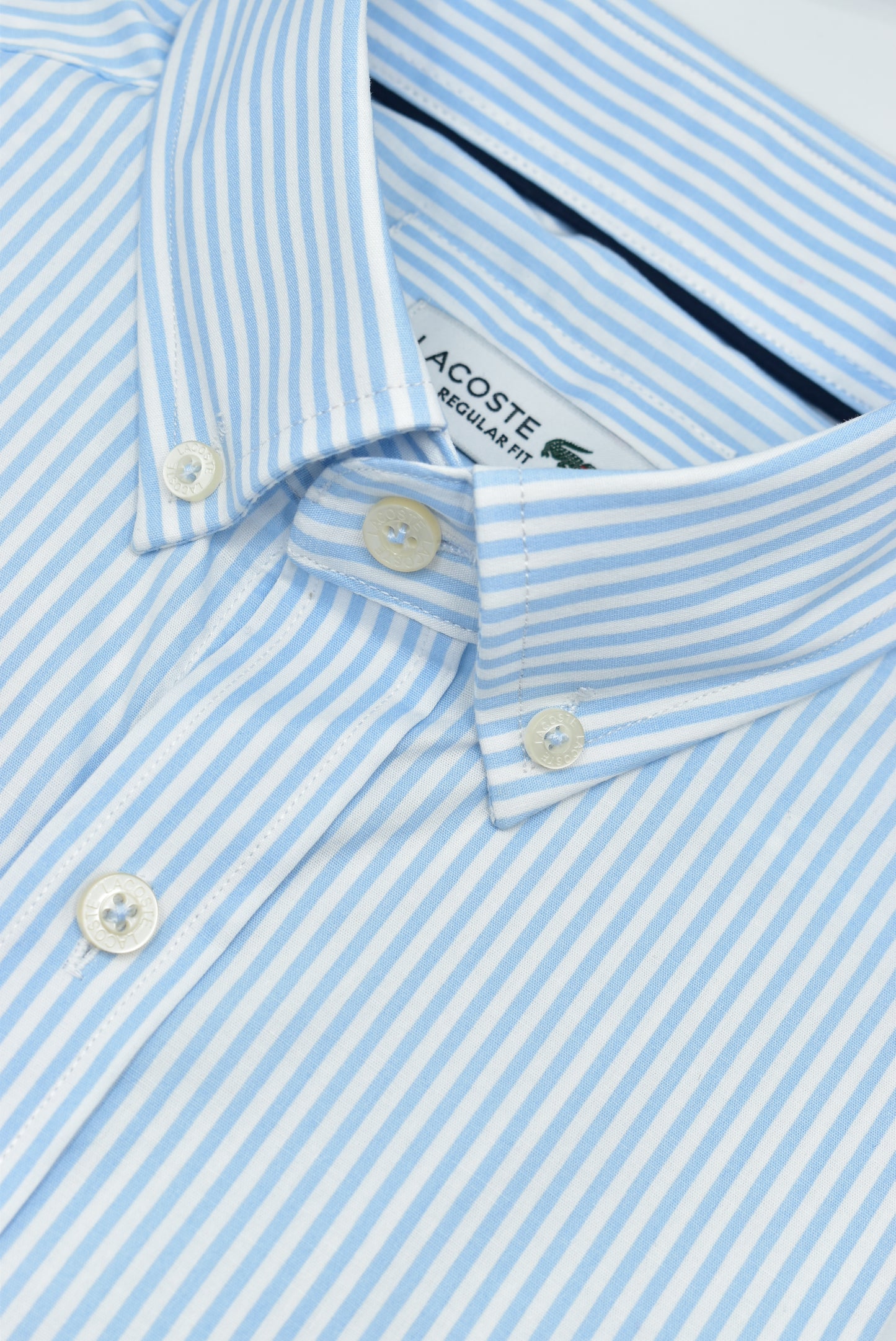CAMISA MANGA LARGA LACOSTE (LAC) AZUL CLARO RAYAS BLANCAS