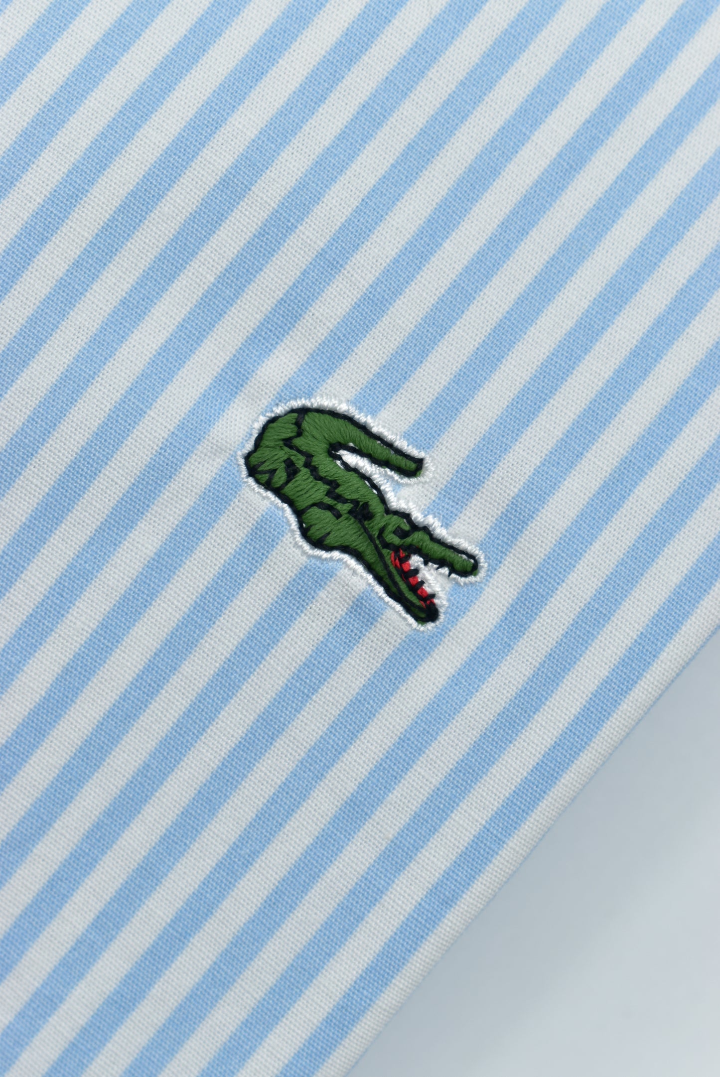 CAMISA MANGA LARGA LACOSTE (LAC) AZUL CLARO RAYAS BLANCAS